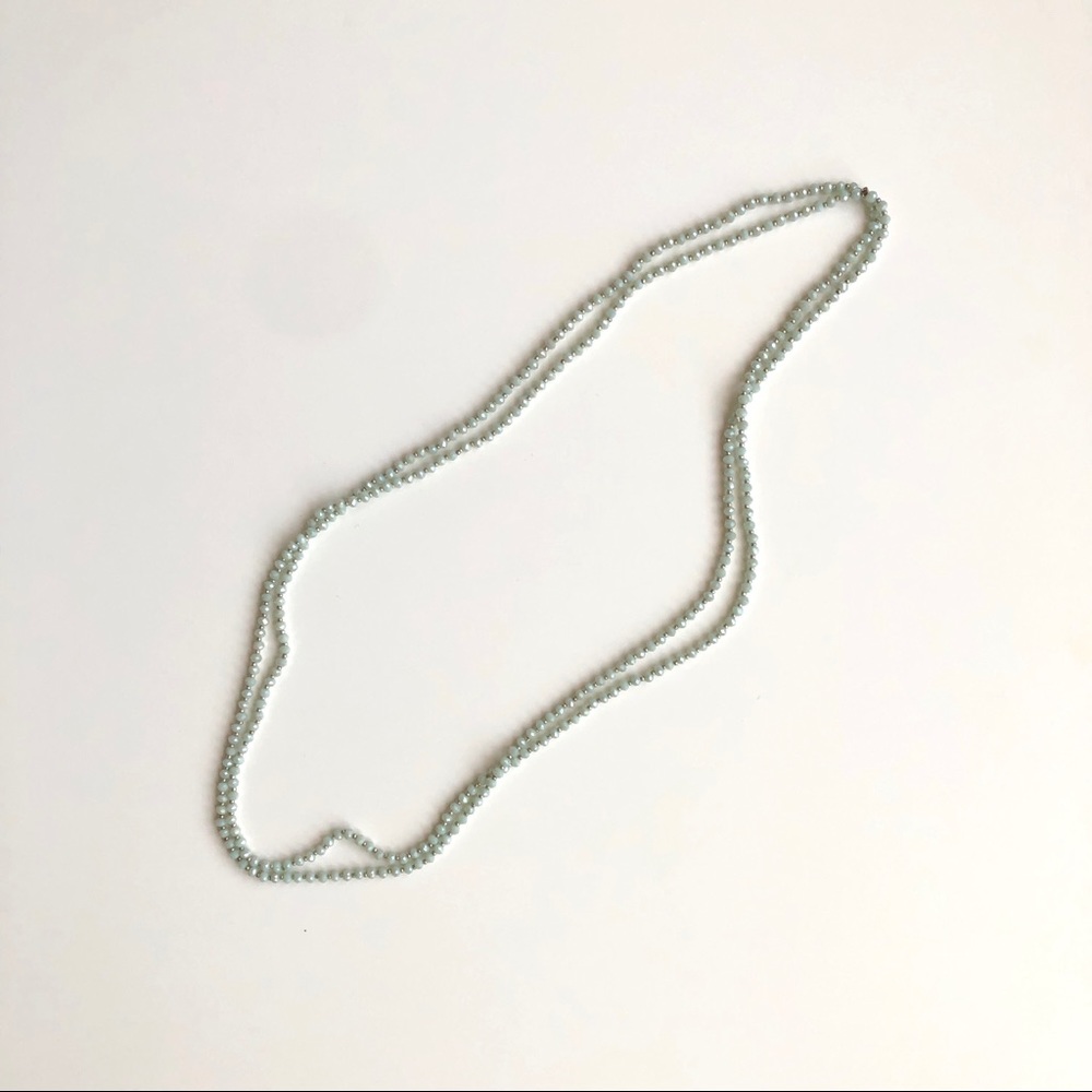 Long mint colored beaded necklace